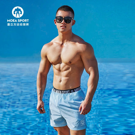 Quick-drying shorts men&#039;s street brand explosions loose casual beach running training fitness pants in summer.
