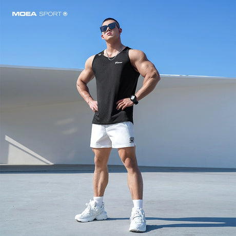 Quick-drying shorts men&#039;s street brand explosions loose casual beach running training fitness pants in summer.
