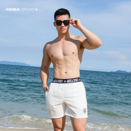 Quick drying sports shorts, men's loose and casual beach thin running, training, and fitness four/five pants